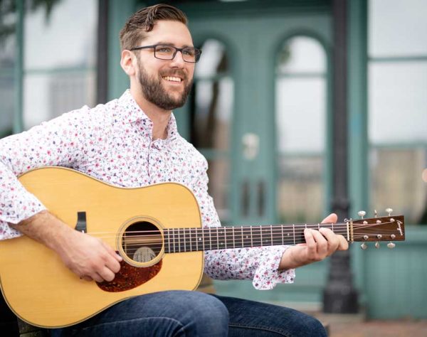 Kyle Baker playing guitar